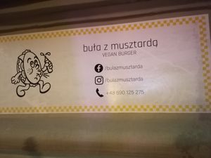 Exterior signage at Buła z Musztardą in Poznan