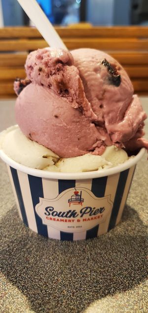 Butter Pecan on the bottom black cherry on top. Nice portion! at South Pier Creamery and Market in South Haven