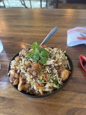 Tsos cauliflower without the mayo drizzle. Rice on bottom. Yum!  at Link & Pin in Charlotte