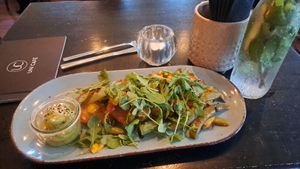 Potatoe roesti with veggies and water with mental and cucumber at Unicafé in Wurzburg
