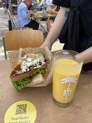 vegan lentil burger and mango lassi   at Linsenmanufaktur in Kassel