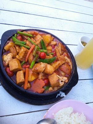 Pineapple tomatoes beans cauliflower and tofu in a really sweet red sauce at TUBTIM Restaurant in Koh Samet