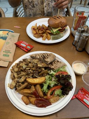 Vegan gyros and vegan chicken burger with vegan cheese and vegan bacon.   at Ubuntu Lounge Bar - Maybe closed in Skiathos