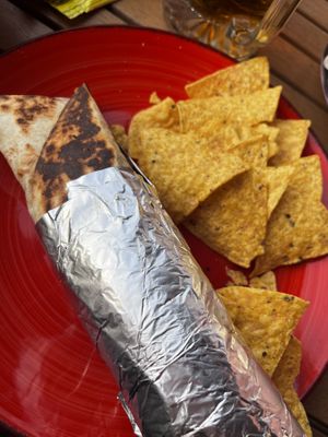 Vegan wrap and tortilla chips. The chef was very knowledgeable and helpful. There were quite a few options including a chilli and a burger. Wouk’s definitely recommend ☺️☺ at Flo's in Tenerife