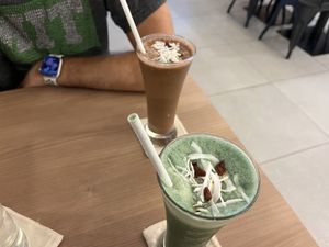 Protein Shake (green) and antioxidant Shake (with cacao)  at Moringa Plant-Based Restaurant in Kuta