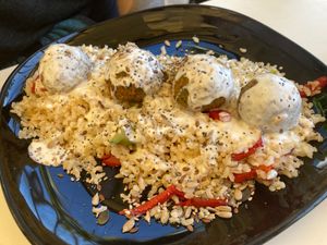 Falafel rice meal with tahini sauce at Chapter One in Gran Canaria