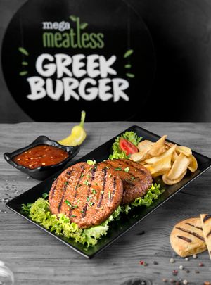 Portion of mega meatless burger at Kokos Pitta in Patras