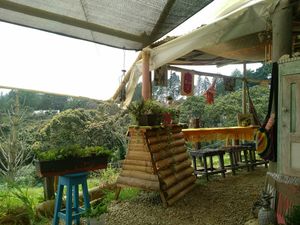 Seats with park view at Cable a Tierra in Medellin