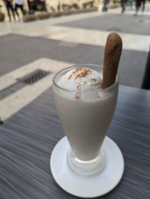 Horchata drink with Horchata ice cream and vegan biscuit at Subies in Valencia