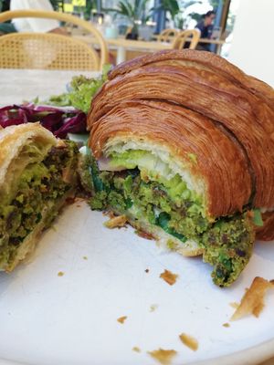 Croissant with asparagus burger and artichoke cream at Ethique Plant-based in Istanbul