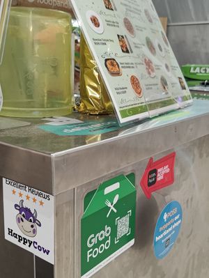 HappyCow Excellent Reviews 5 Stars decal at So Green in East Singapore