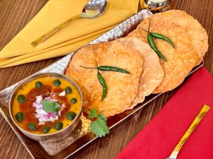 Dal Pakwan — 2 Deep-fried Pakwans(crisp flatbread) served with a tangy and spicy chana dal. at Tatta Chulha in Vancouver
