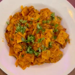 Rajasthani Kawe — Dried bread, flavored with spices, onions and tomatoes and garnish with fresh cilantro. at Tatta Chulha in Vancouver