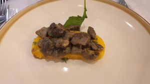 Fried polenta with mushrooms (1 out of 2 in the dish) at Carnalmente in Assisi