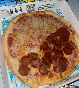 half cheese half (veg) pepperoni  at Playa Pizza in Windermere