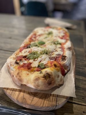 Margherita pizza with pesto   at Ortica Italian Plant Based in Urmston