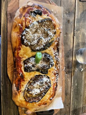 Parmigiana pinsa  at Ortica Italian Plant Based in Urmston