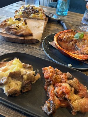 Pinsa and aubergine parmigiana   at Ortica Italian Plant Based in Urmston