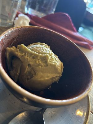 Scoop of Pistachio iceream   at Ortica Italian Plant Based in Urmston