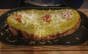 Bruschetta Fave & N'duja: Broad bean purée, spicy N'duja, grated parmesan cheese, evoo at Ortica Italian Plant Based in Urmston