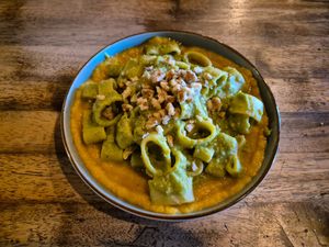 calamarata* piselli e zucca at Ortica Italian Plant Based in Urmston