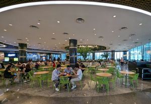 Dining area at Greendot 绿一点 - Asia Square in Central Singapore