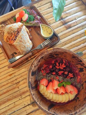 Berry smoothie bowl and tofu chorizo burrito at Pure Vegan Heaven - Thong Sala in Koh Phangan