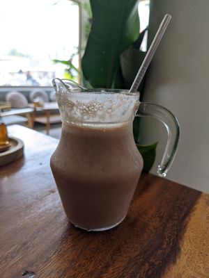 Cacao, banana, peanut butter milkshake at Pure Vegan Heaven - Thong Sala in Koh Phangan