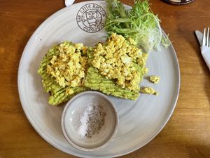 Smashed avocado on sourdough ($4) with added scrambled tofu (50¢)  at The Little Red Fox Espresso in Siem Reap