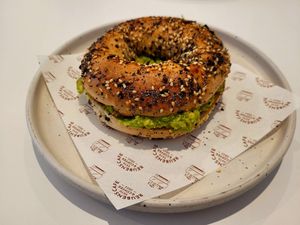 Smashed Avacado, Lemon & Chilli on Everything Bagel. at Reubens Cafe & Coffee in Holyhead