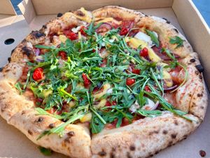 Vegetable pizza with vegan cheese, finished with rocket salad and balsamic vinegar at Oak & Grain - Maybe closed in Ullapool