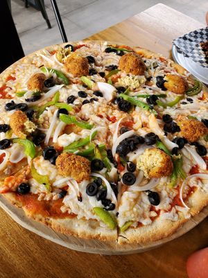 GF pizza with Falafel - delicious!!!!!!! at VegMex in La Paz