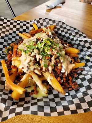 Loaded fries - Holy Moly were they good!!!! Best fries ever! at VegMex in La Paz