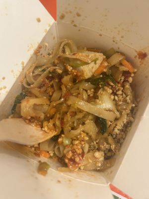 Rice noodles with veggies, tofu, teriyaki, peanuts and spicy saucee  at HIT'WOK in Ljubljana
