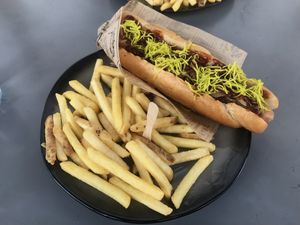 Bbq hotdog and fries  at Eh Wurst Vegane Würstelbar in Vienna