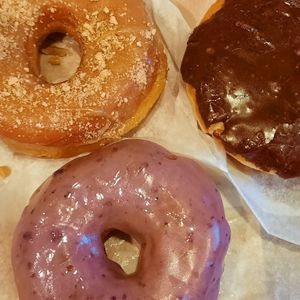 Maple French toast, blueberry, and Boston cream at Dun-Well Doughnuts in Brooklyn