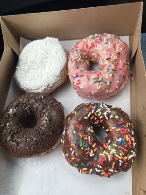 Raspberry jelly, strawberry, chocolate, and triple chocolate  at Dun-Well Doughnuts in Brooklyn