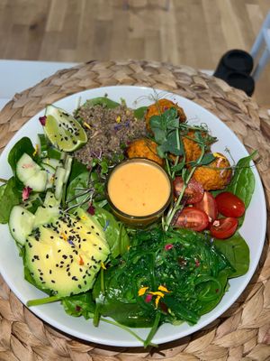 Green Gaia Salad Bowl with peanut coconut satay dressing - Vegan at Love Live Light Healing Hub in Cardiff