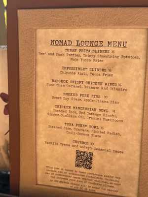 Impossible sliders and bread service (other side of menu) can both be modified to be vegan   at Walt Disney World - Tiffins in Lake Buena Vista