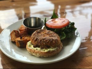 crab cake sandwich with sweet potato wedges at Majani in Chicago
