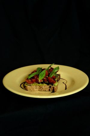 T.B.B. Toast: locally sourced multigrain toast with cherry tomatoes, fresh basil & balsamic glaze on smashed avocado at Subculture Coffee Roasters in West Palm Beach