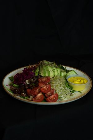 Botanical Salad: superseeded avocado, mesclun, seasonal vegetables, alfalfa sprouts, dates, pickled vegetables, vegan chef's dressing at Subculture Coffee Roasters in West Palm Beach