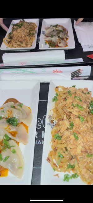 I didn’t take photos so here are some blurry screenshots of a video lol doesn’t do it Justice but INCREDIBLE food!  at The Rogue Panda in Brooklyn