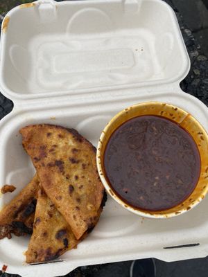 Birria tacos  at Rojos Mexican Food in Seattle