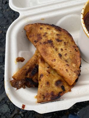 Birria tacos  at Rojos Mexican Food in Seattle
