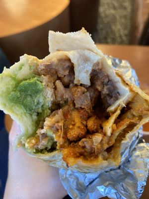 Cremosa burrito with al pastor   at Rojos Mexican Food in Seattle