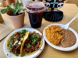 1 carne asada, 1 carnitas taco, rice & beans, agua de jamaica   at Rojos Mexican Food in Seattle