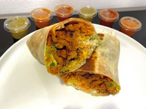 loaded burrito w/al pastor, pedro style (plated at home) at Rojos Mexican Food in Seattle