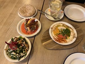 Mezze: pita, cauliflower, hummus and salad  at Mana Mana - West in Amsterdam