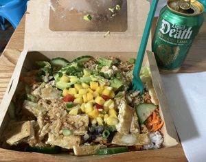 Veggie rice bowl with tofu and added black beans. The citrus sauce was very delicious on it!  at The Take Out in Fayetteville